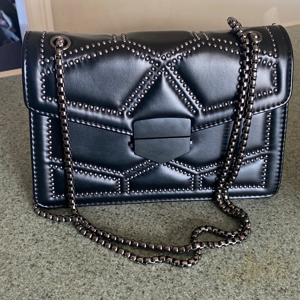 Crossbody - only carried once.